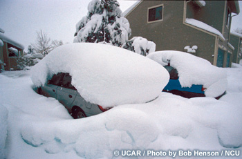 Cars buried from a heavy snowfall