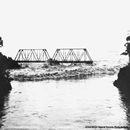 A tsunami 
bore, or sheer stepped wave, rolls into the Wailuku River during the 
1946 tsunami in Hawaii.