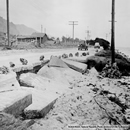 Damage
 to concrete paving, Kaaawa Territorial Highway, Hawaii, after the 1946 
Alaska tsunami. The sand under the road has been scoured out, causing 
the road to collapse.